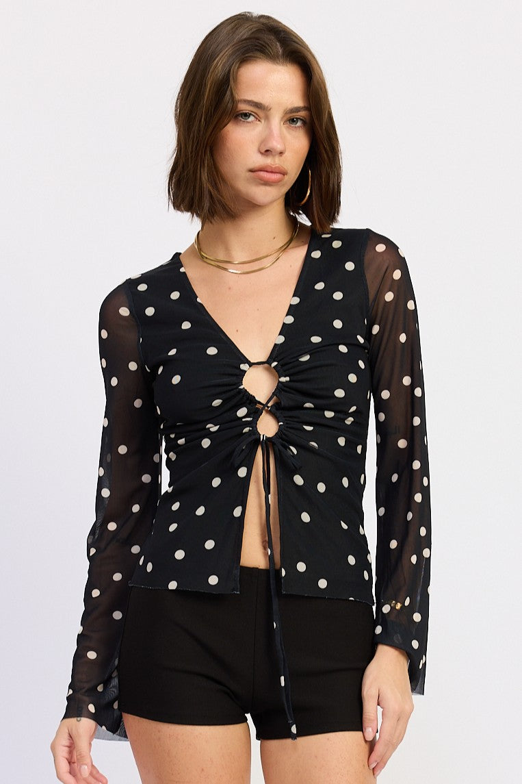 Black polka dot mesh top with adjustable ruched front and sheer long sleeves
