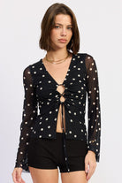 Black polka dot mesh top with adjustable ruched front and sheer long sleeves
