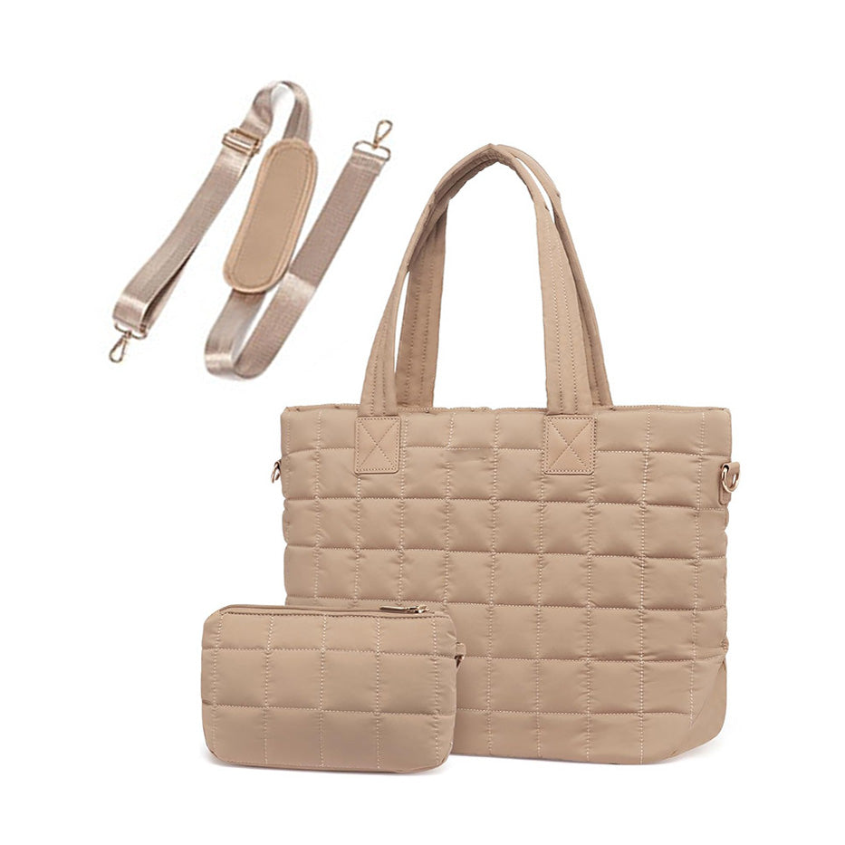 Mocha quilted travel tote with matching pouch and strap on a white background
