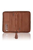 A brown leather zip-around wallet organizer with multiple interior card slots, zipper compartments, a clear ID window, and a tassel pull, shown open on a white background.