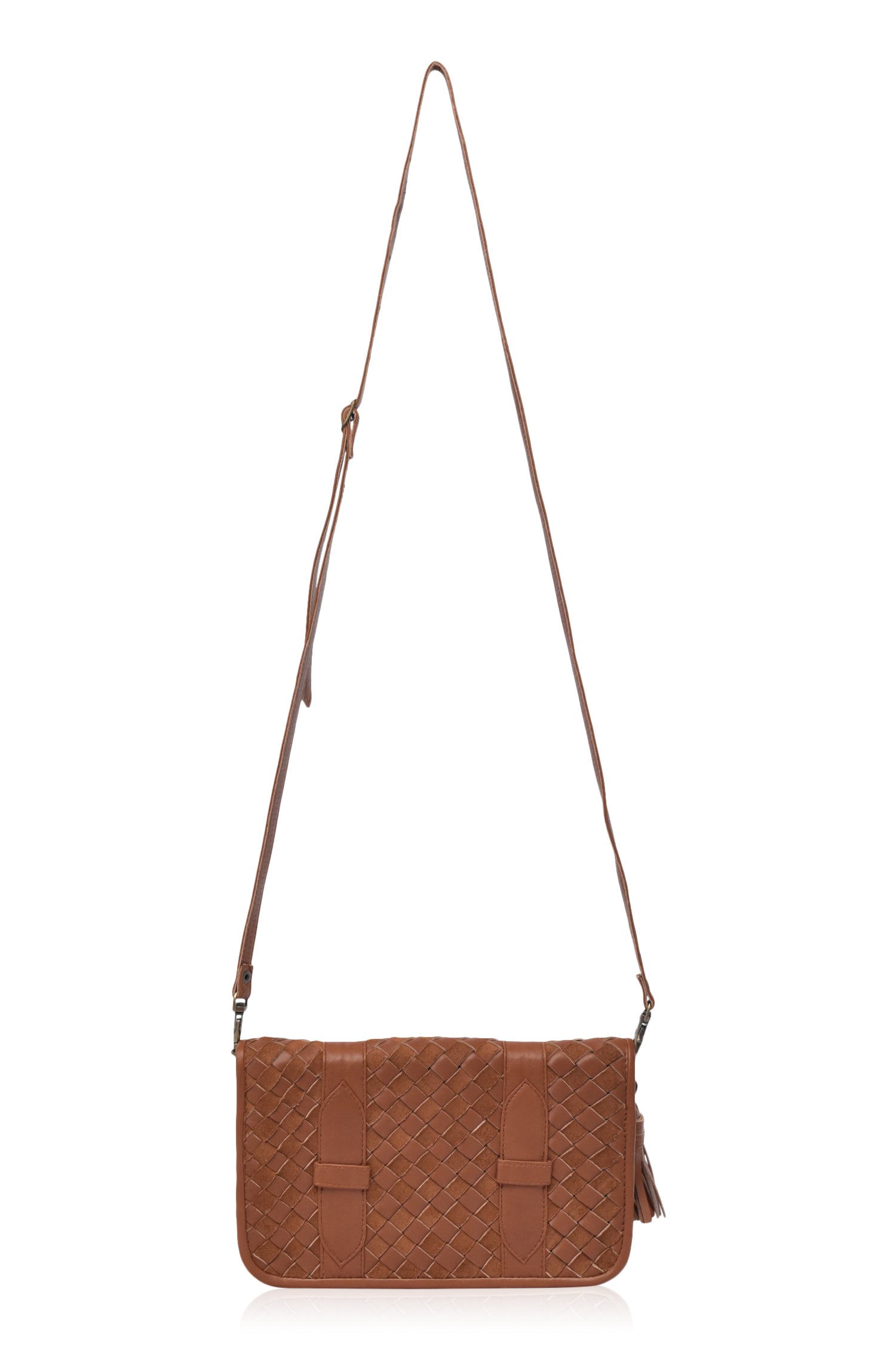 Brown woven leather clutch with straps to be crossbody on a white background