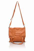 Brown leather bag with a strap on a white background