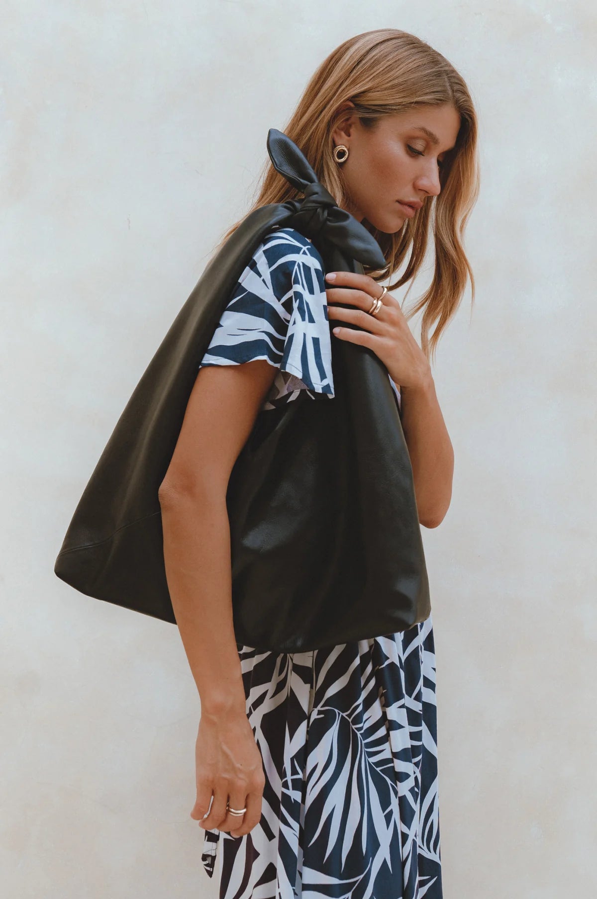 Nudo Knotted Leather Shoulder Bag in black handcrafted leather with an oversized slouchy silhouette and knotted shoulder strap.