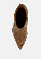 Brown pointed-toe shoe with intricate patterns on a white background