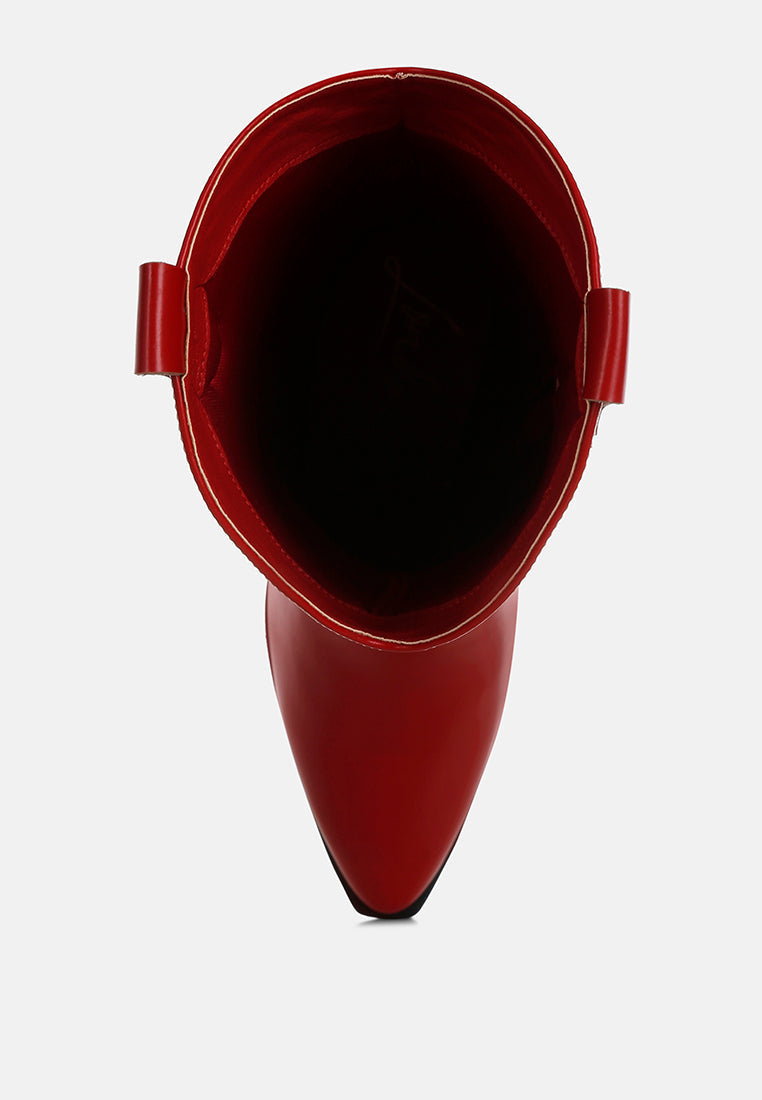 Red rain boot on a light gray background