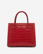 Red handbag with crocodile pattern on a white background