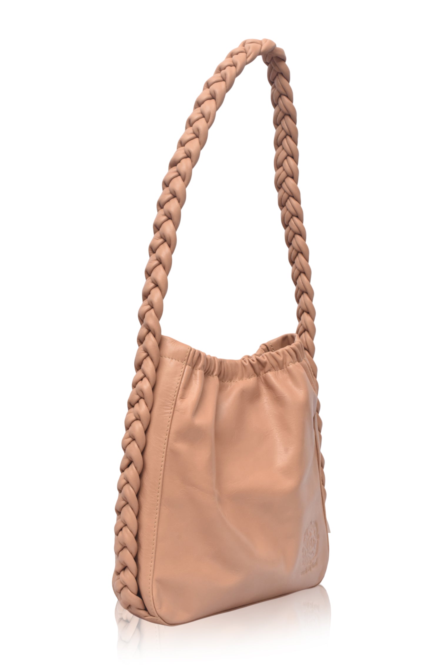 Side profile of the Sivuple Leather Shoulder Bag in vintage beige showcasing the braided leather shoulder strap and slim bucket design.