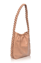 Side profile of the Sivuple Leather Shoulder Bag in vintage beige showcasing the braided leather shoulder strap and slim bucket design.