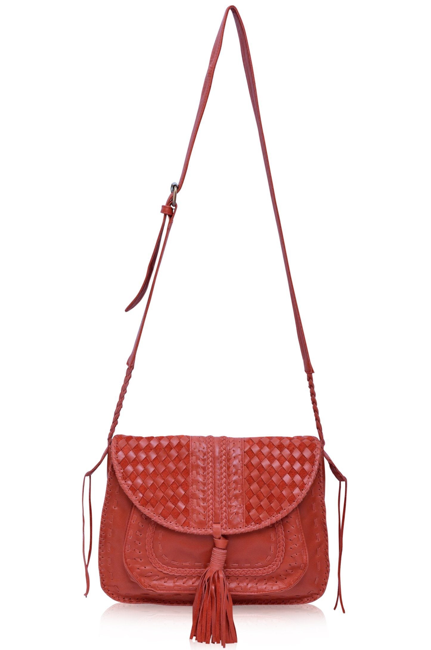Red woven handbag with tassel and long adjustable strap on a white background