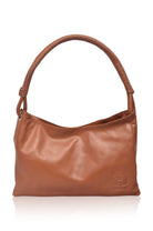 Brown leather handbag on a white background