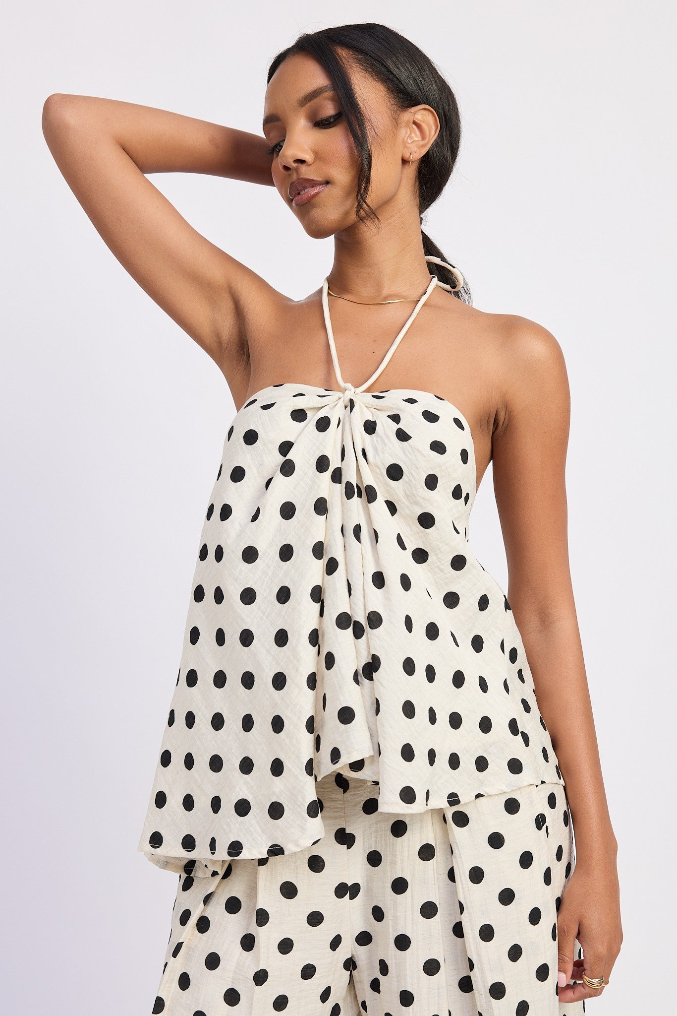 Polka dot halter top with draped front, front view
