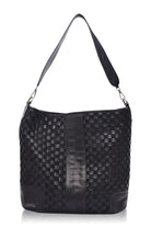 Back view of the black Soho Lane Woven Leather Shoulder Bag with handwoven genuine leather panels
