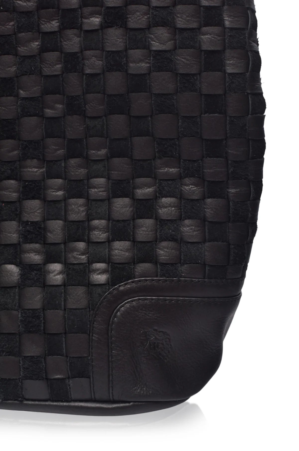 Close up of the black Soho Lane Woven Leather Shoulder Bag showing handcrafted woven leather texture