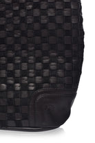 Close up of the black Soho Lane Woven Leather Shoulder Bag showing handcrafted woven leather texture
