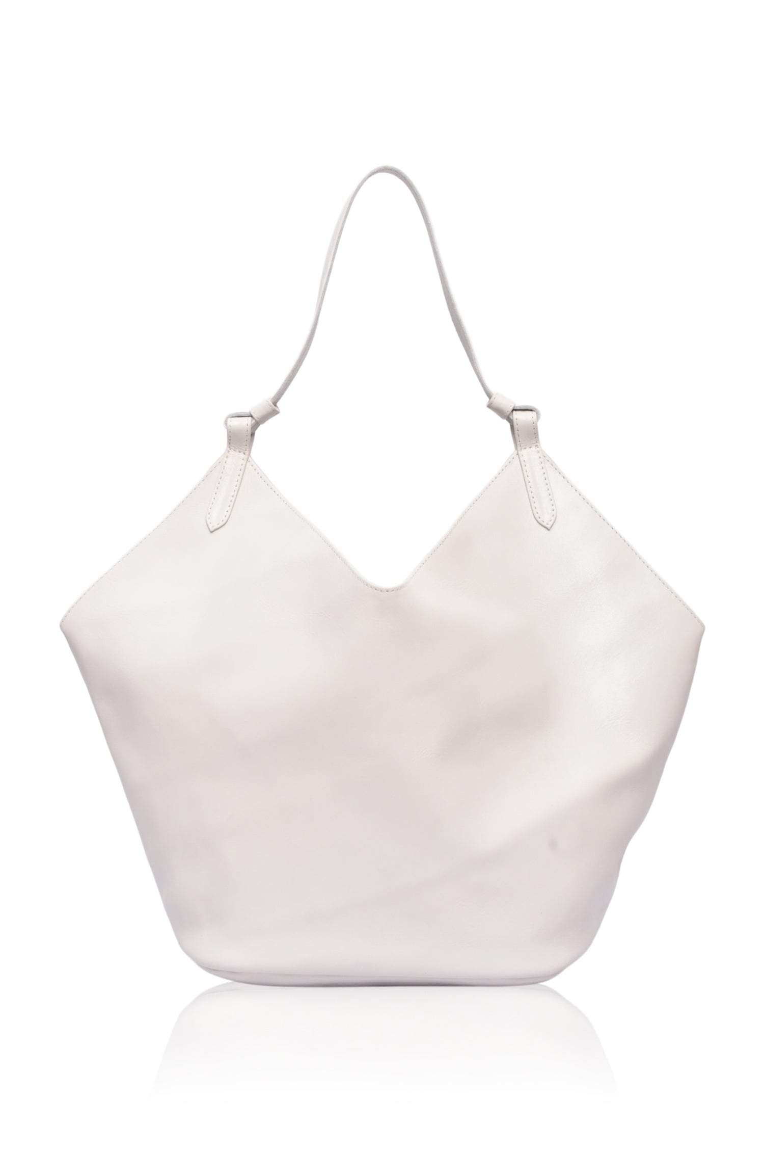 White soft leather bag with a leather handle on a white background, front view