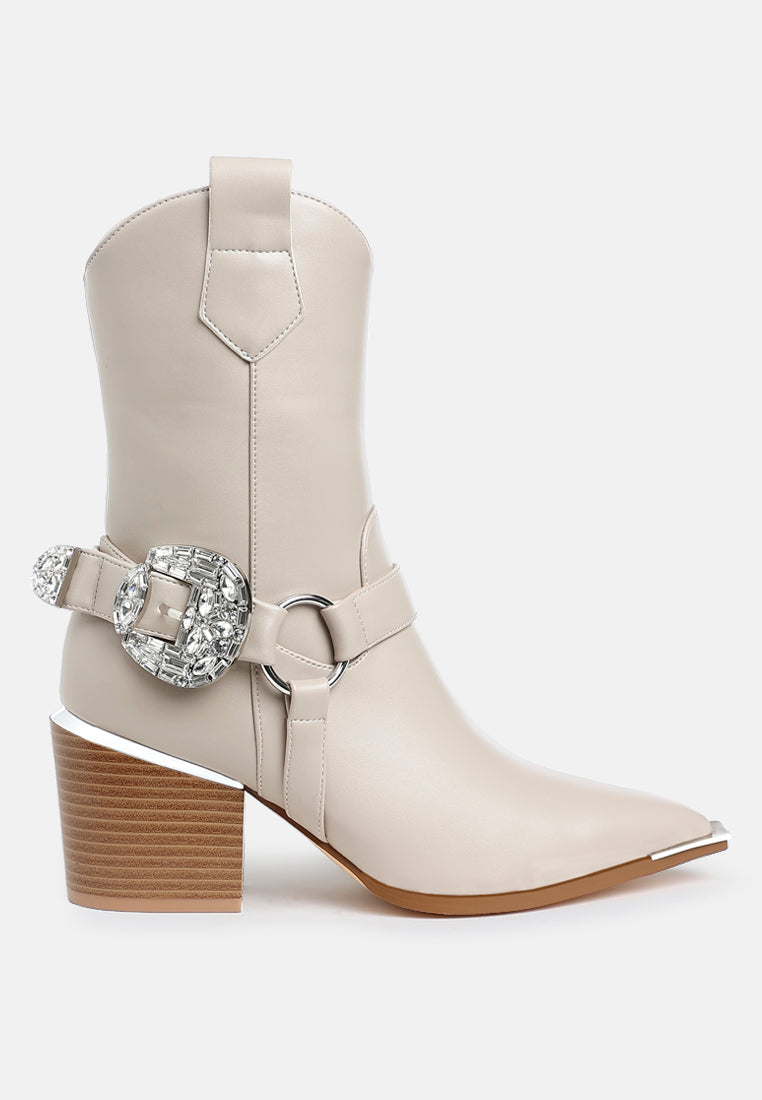 Rodeo Romance Western Ankle Boots in beige faux leather with oversized silver diamante buckle, harness strap, pointed metallic toe and block heel.