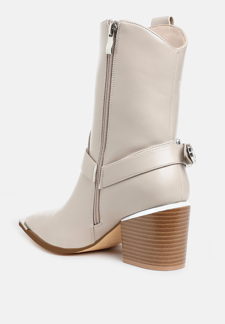 Rear angled view of beige Rodeo Romance Western Ankle Boots showing side zipper, pull tab, stacked look block heel and harness strap.