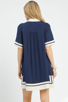 Back view of Yacht Club Linen Mini Dress showing contrast striped hem border and shift silhouette, AVAH