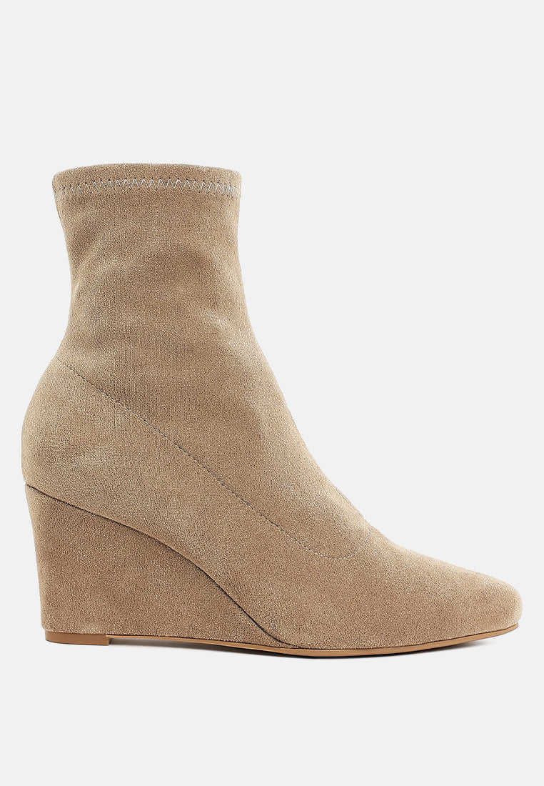 Beige microfiber ankle boot on a white background