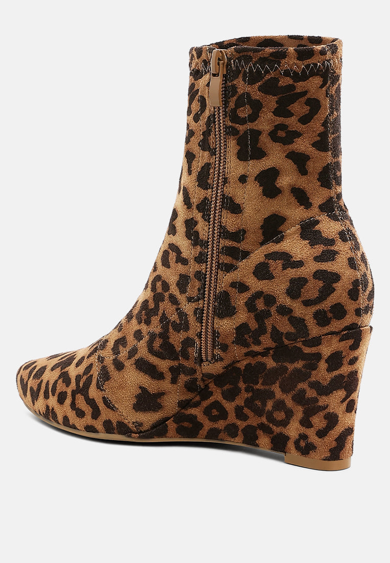 Leopard print microfiber ankle boot on a white background, back view
