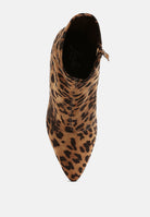 Leopard print ankle boot on a light gray background, top view
