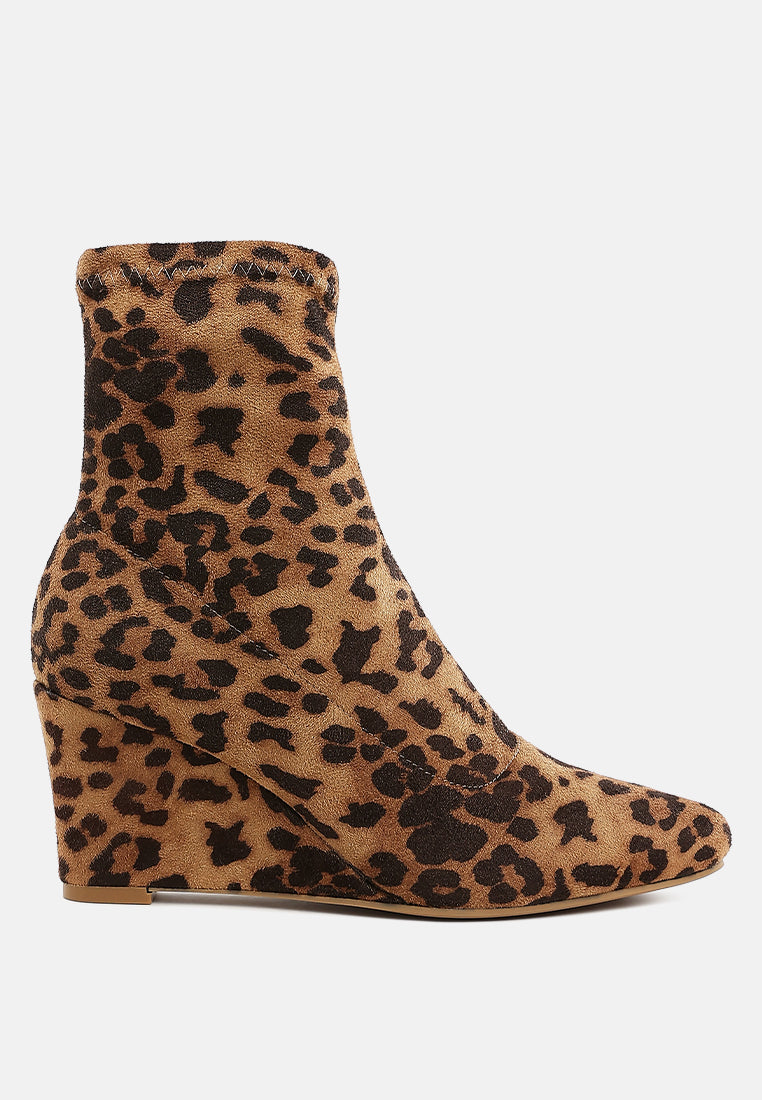 Leopard print microfiber ankle boot on a white background