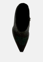 Black pointed-toe shoe on a white background top view