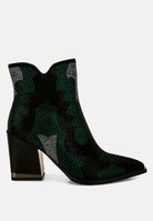 Black ankle boot with green rhinestone pattern on a white background