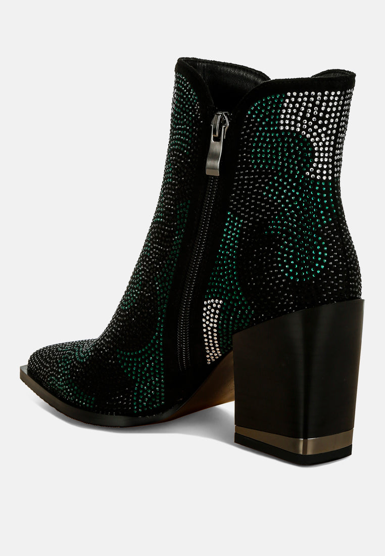 Black ankle boot with green rhinestone pattern on a white background, back view