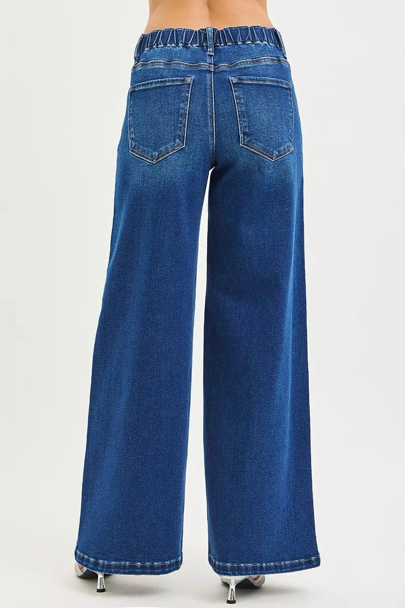 Back view of wide leg drawstring jeans showing elasticated waist and back pockets, AVAH