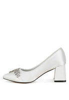 White satin block heel with crystal embellishment, side view
