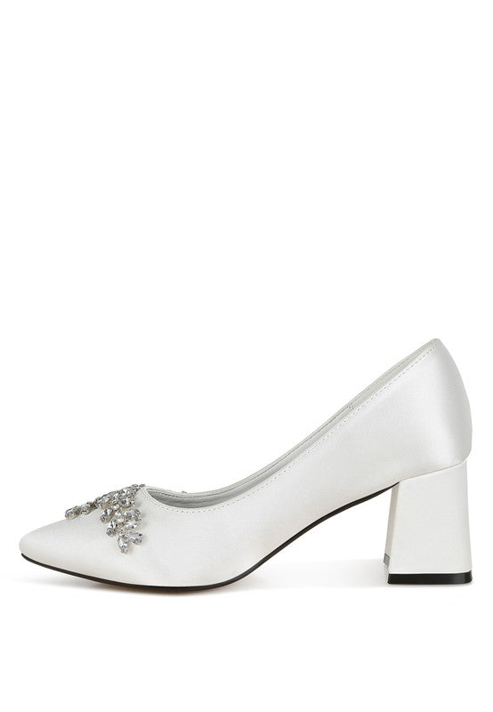 White satin block heel with crystal embellishment, side view
