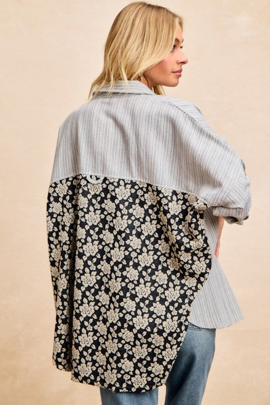 Back view of Florence Mixed Print Button Down Shirt featuring gray pinstripe yoke, dark floral print and longer hem.