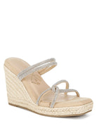 Blush wedge sandal with rhinestone straps on a white background
