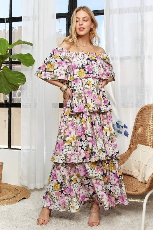 Front view of floral tiered off shoulder maxi dress
