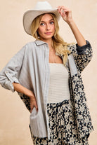 Front view of Florence Mixed Print Button Down Shirt showing asymmetrical floral and pinstripe design with button front.