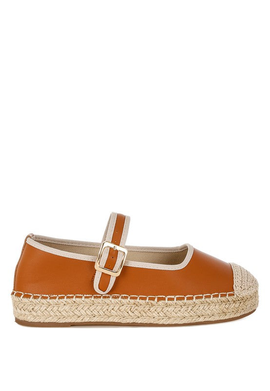 Side angle showing natural jute platform and tan leather upper