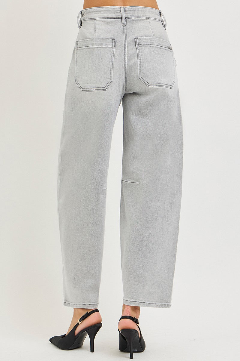 Back view of grey barrel leg jeans with patch back pockets and contrast stitching, AVAH