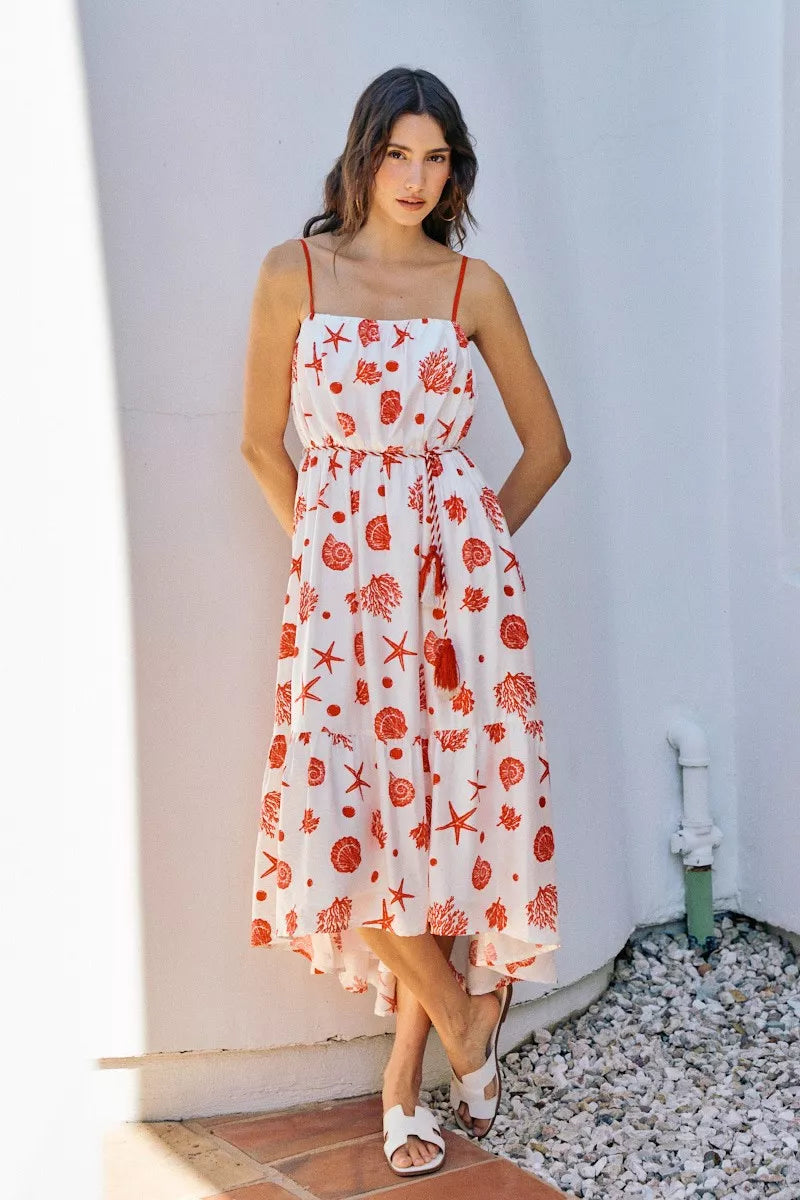 coral print midi dress with tassel tie waist and spaghetti straps