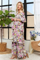 Side view of pink and yellow floral layered maxi dress
