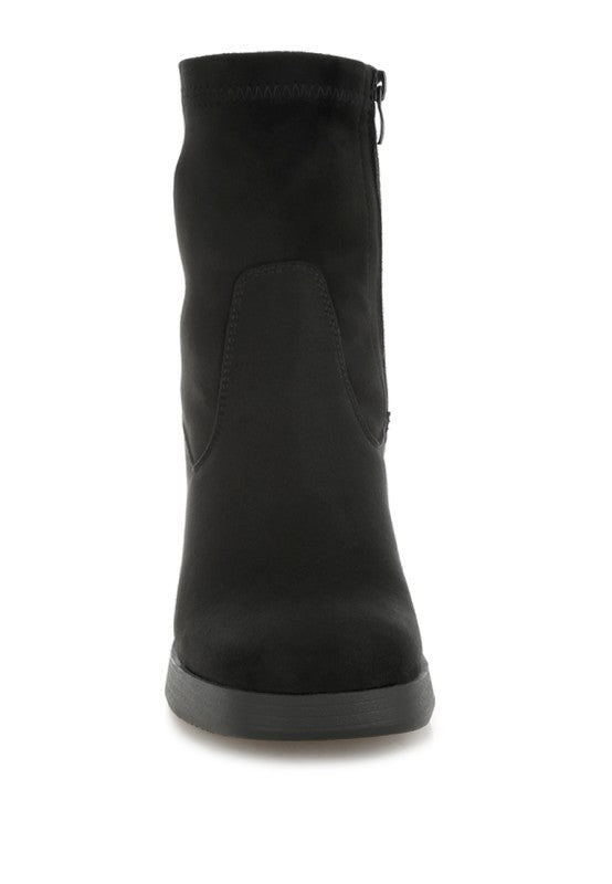 Front view of black platform boot showing round toe design.