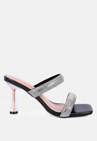 Black high-heeled sandal with metallic heel, rhinestone details, and square toe on a white background, side view
