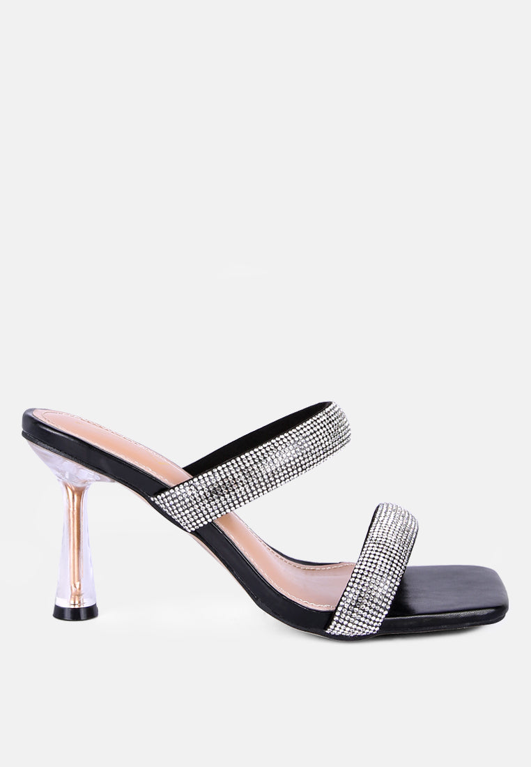 Black high-heeled sandal with metallic heel, rhinestone details, and square toe on a white background, side view