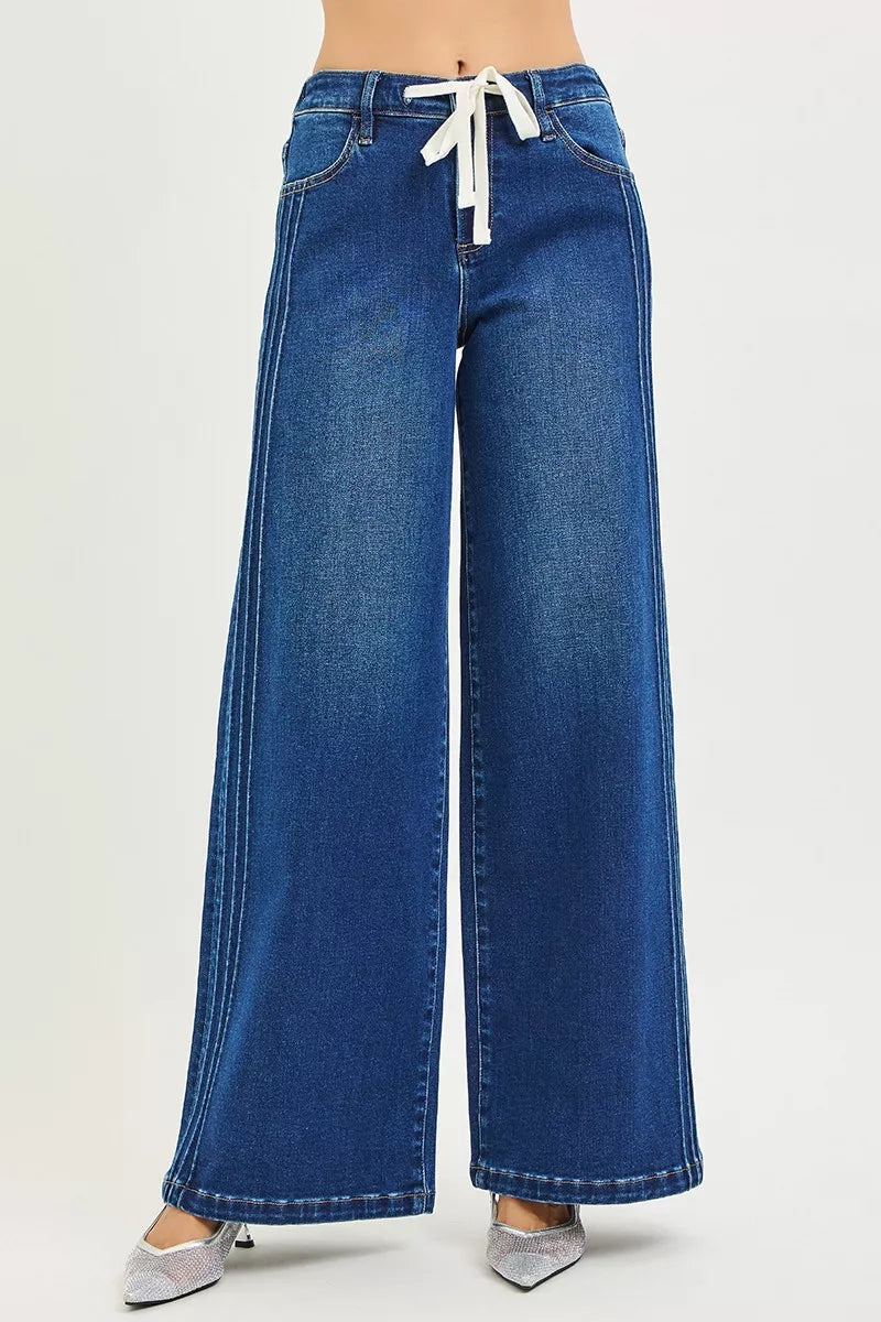  Front view of wide leg drawstring jeans with raised seam detail in indigo wash, AVAH