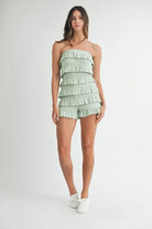 Full length view of sage strapless summer romper
