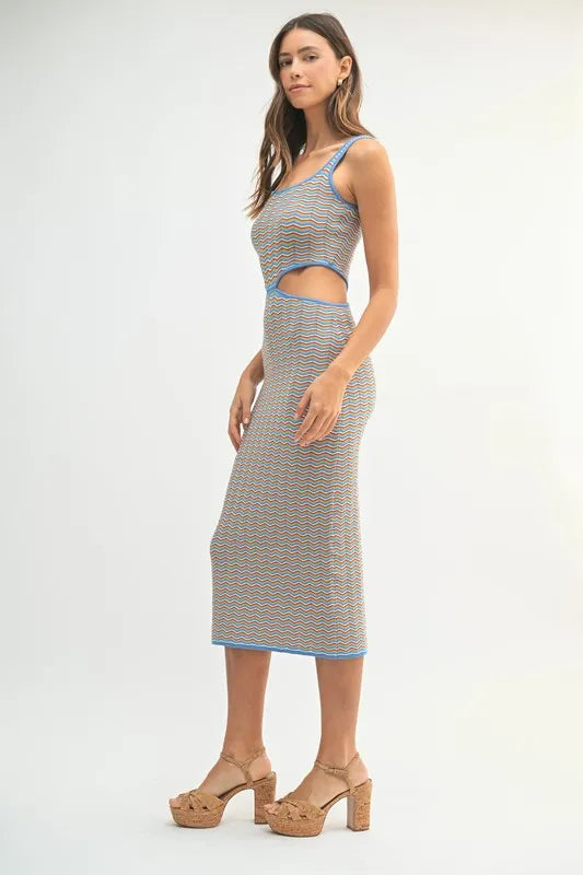 Side view of chevron bodycon midi dress with blue trim
