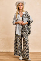 Florence Mixed Print Button Down Shirt with cream floral print, gray striped panels and contrasting chest pocket, styled with matching floral pants.