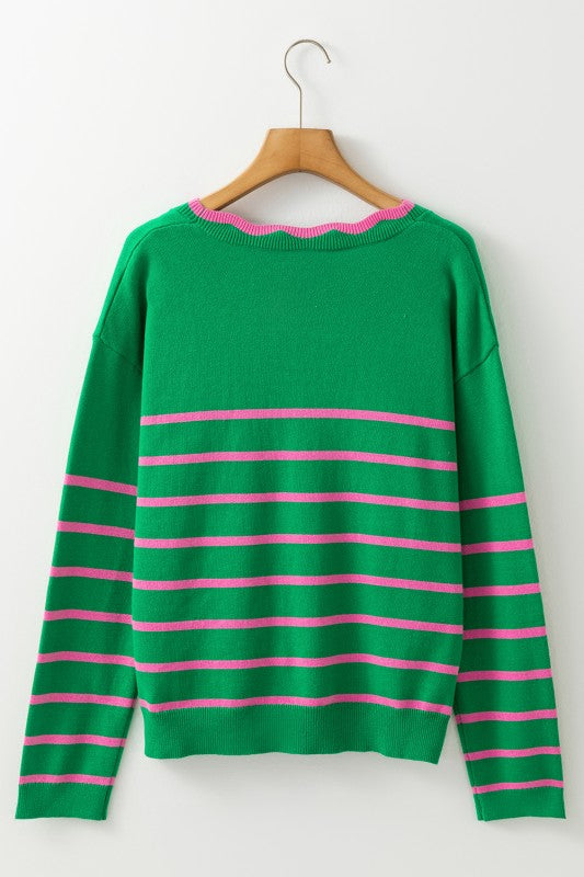 Back view of striped cardigan on hanger showing relaxed fit