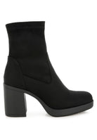 Black platform block heel boot, profile view.
