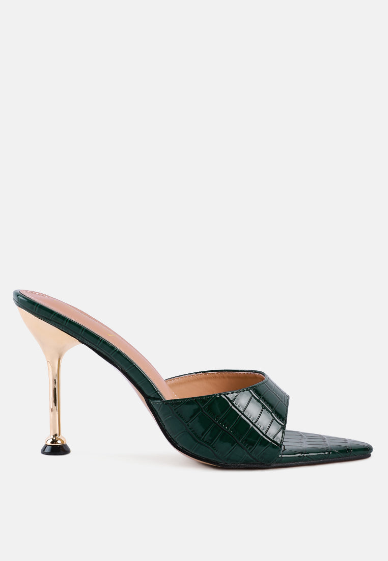Green metallic heeled pointed toed sandal with croc texture faux leather and accented with the metallic accent side view